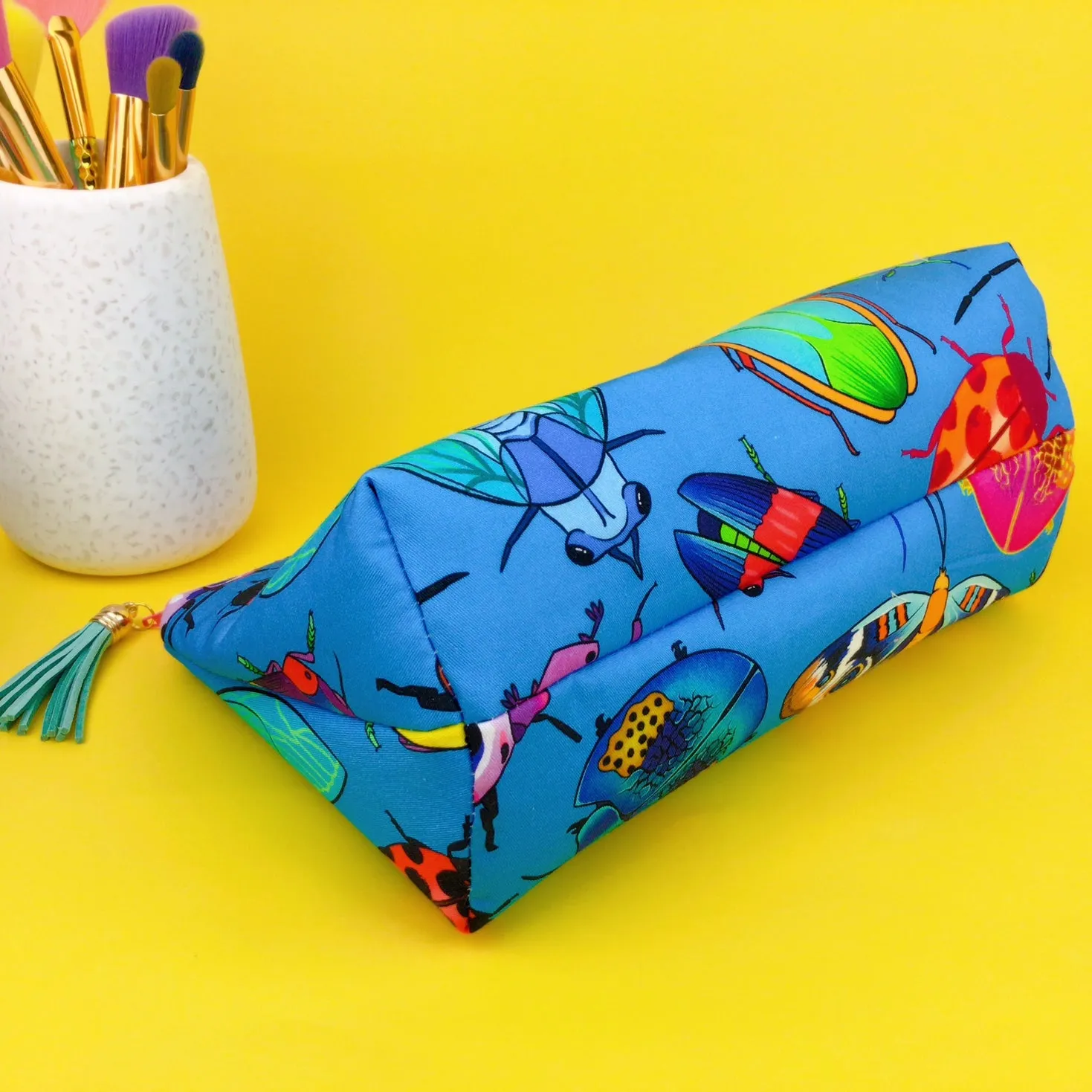 Buggin Blue Medium Makeup Bag. Kasey Rainbow Design.