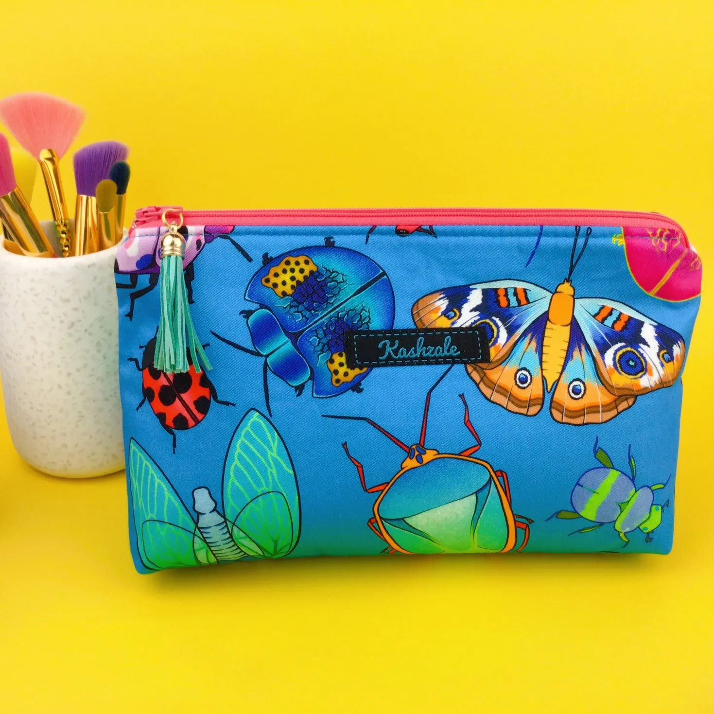 Buggin Blue Medium Makeup Bag. Kasey Rainbow Design.