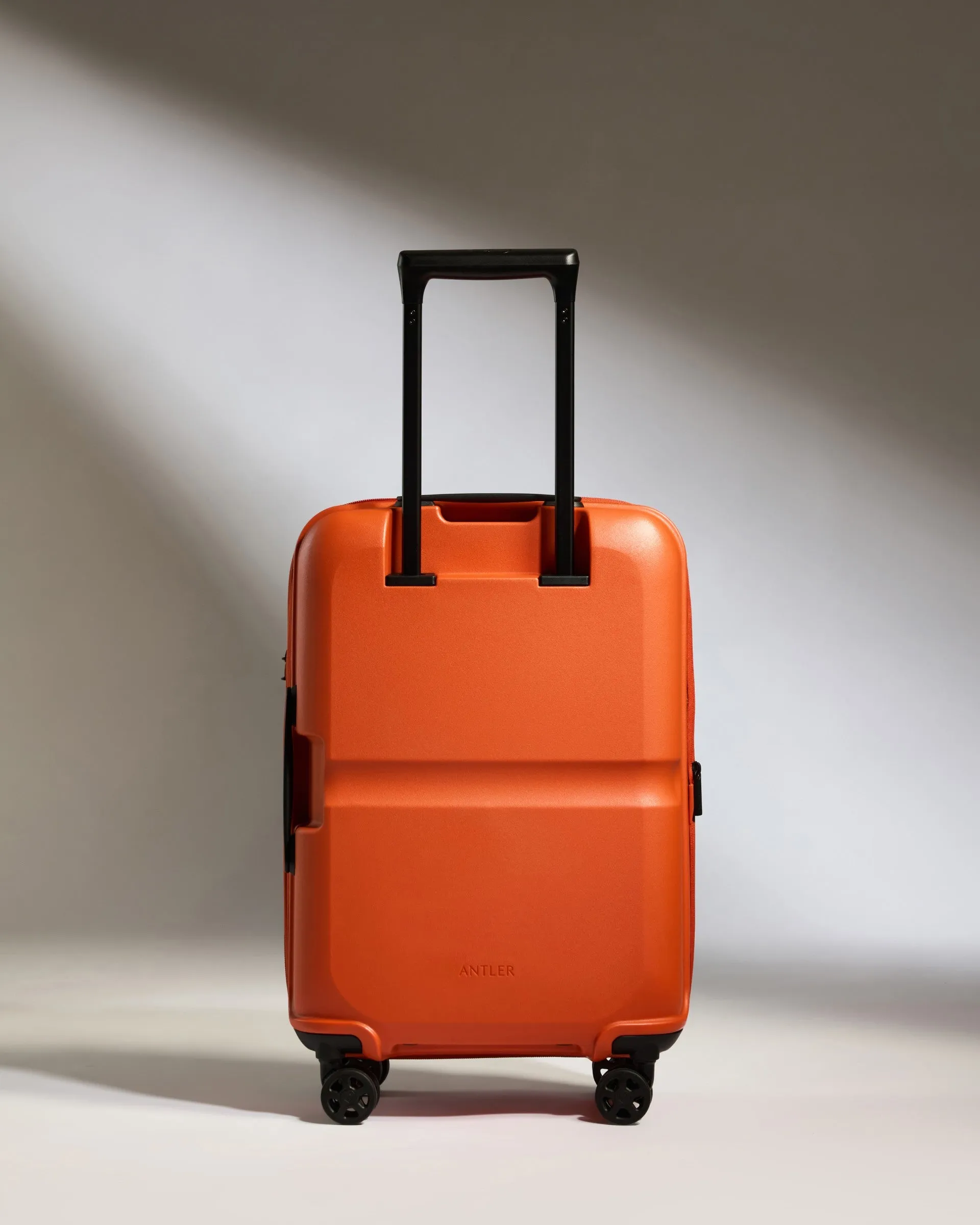 Expandable Carry-on Luggage in Ember Orange - Single Stripe