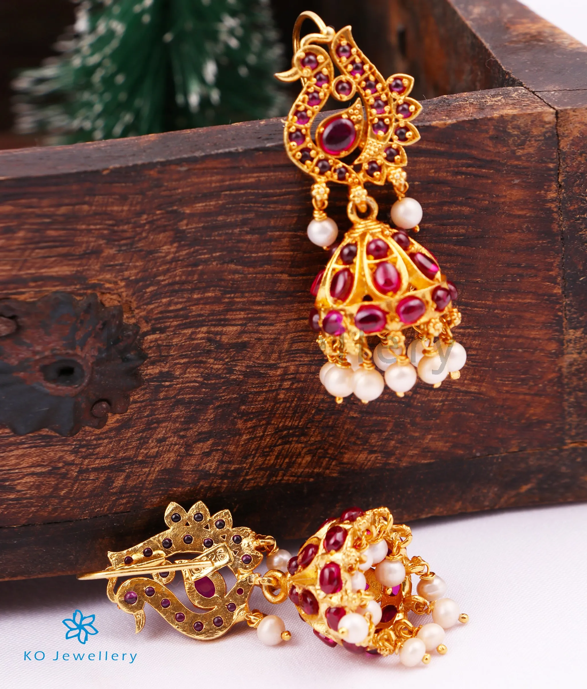 The Hridya Silver Peacock Jhumka