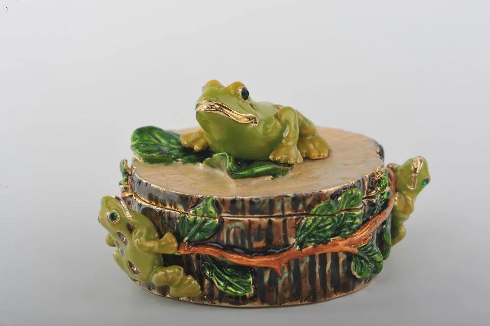 Three Frogs on Tree Trunk